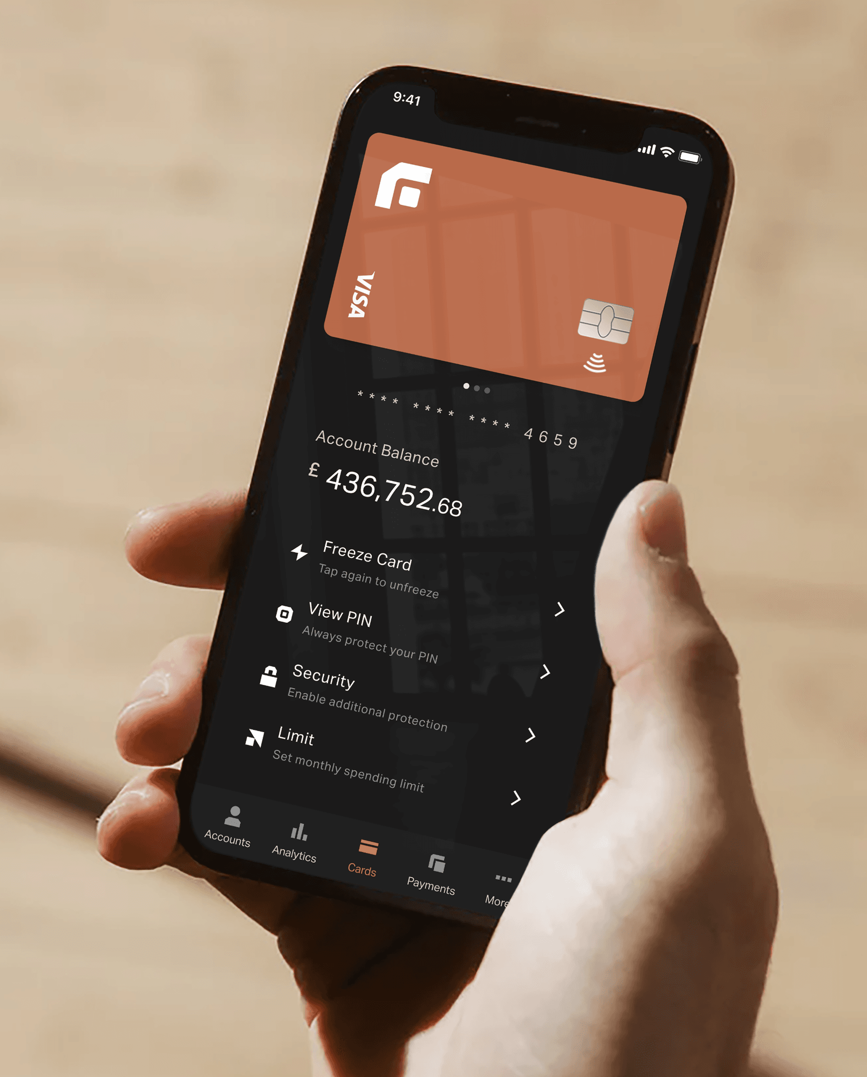 The Founders Bank app on a phone held in one hand, showing a Visa card, account balance and card controls.
